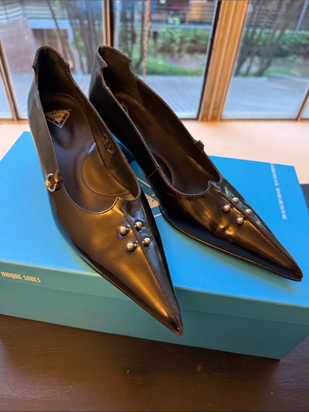 John Fluevog Hilda Black Women's Pointed Toe Leather Flats with Piercing Detail